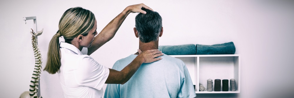 neck pain appointment with osteopathic practitioner